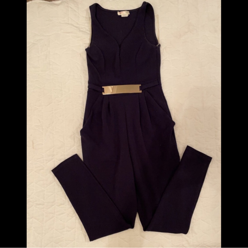 Jumpsuit with belt attached